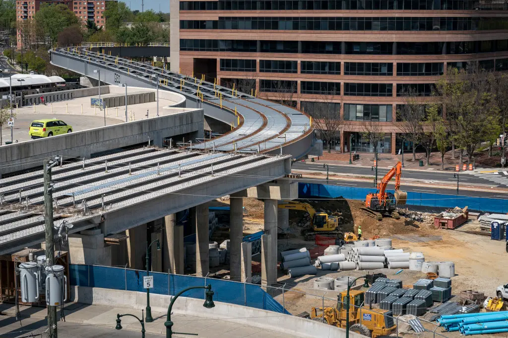 a raised track under construction in a city