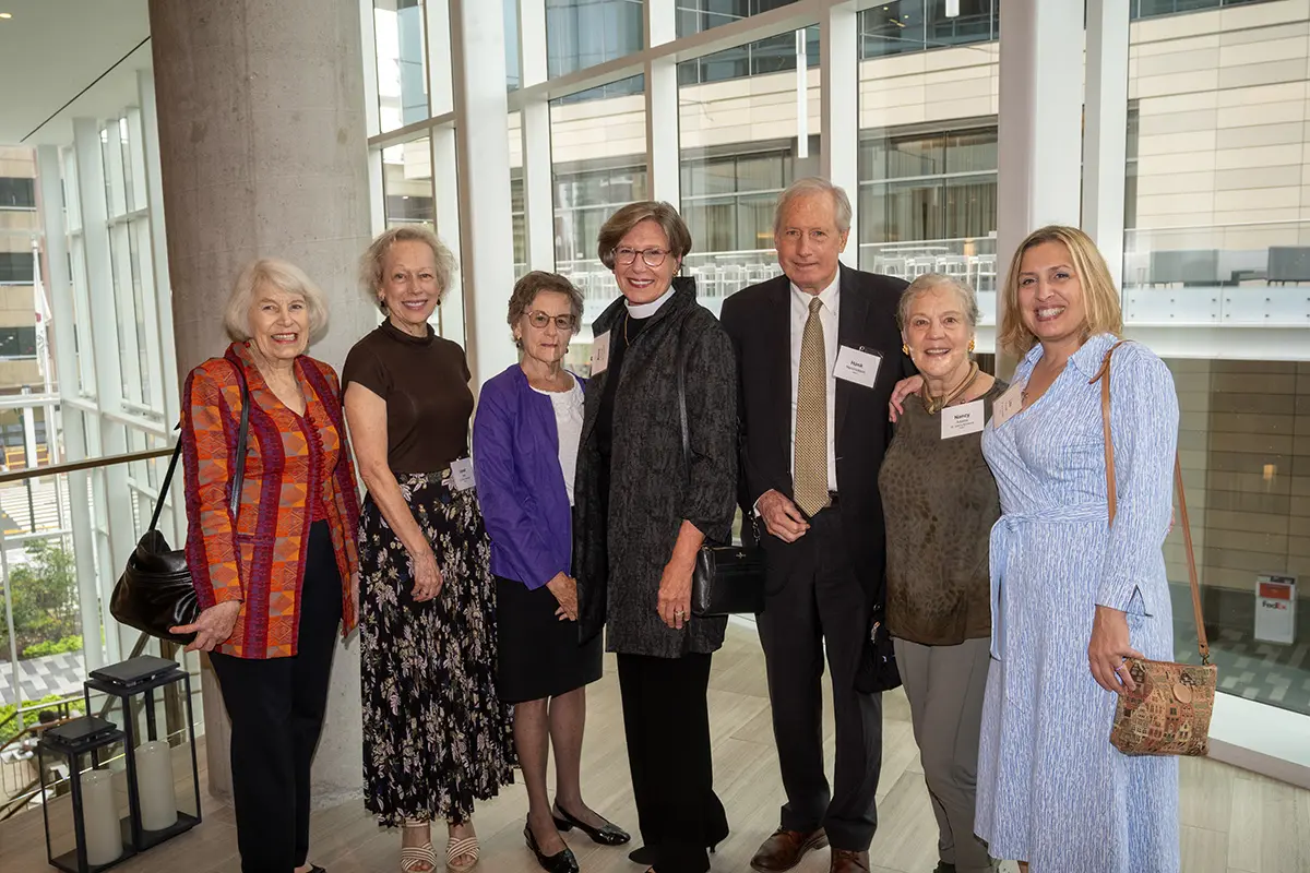 2024 Women Who Inspire honoree and deacon at St. John’s Norwood Episcopal Church Anne Derse, center, and guests.
