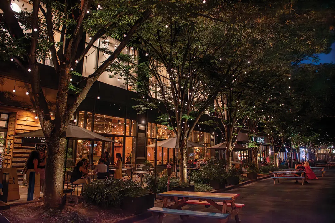People sitting and hanging out at Bethesda Row shops and restaurants