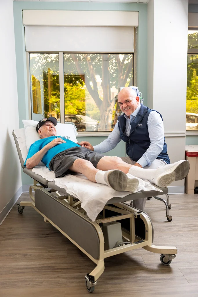 Dr. Terrence Sheehan, Physical Medicine & Rehabilitation, with patient Jordan Strauss