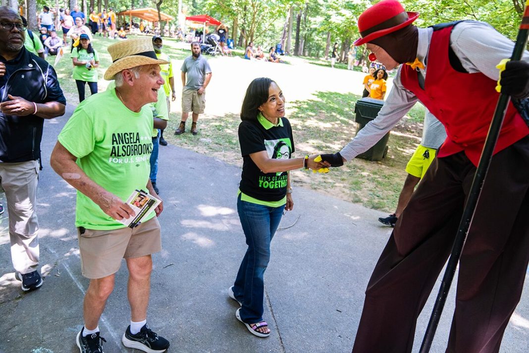 Sen. Angela Alsobrooks greets a performer during the Scotland Juneteenth Heritage